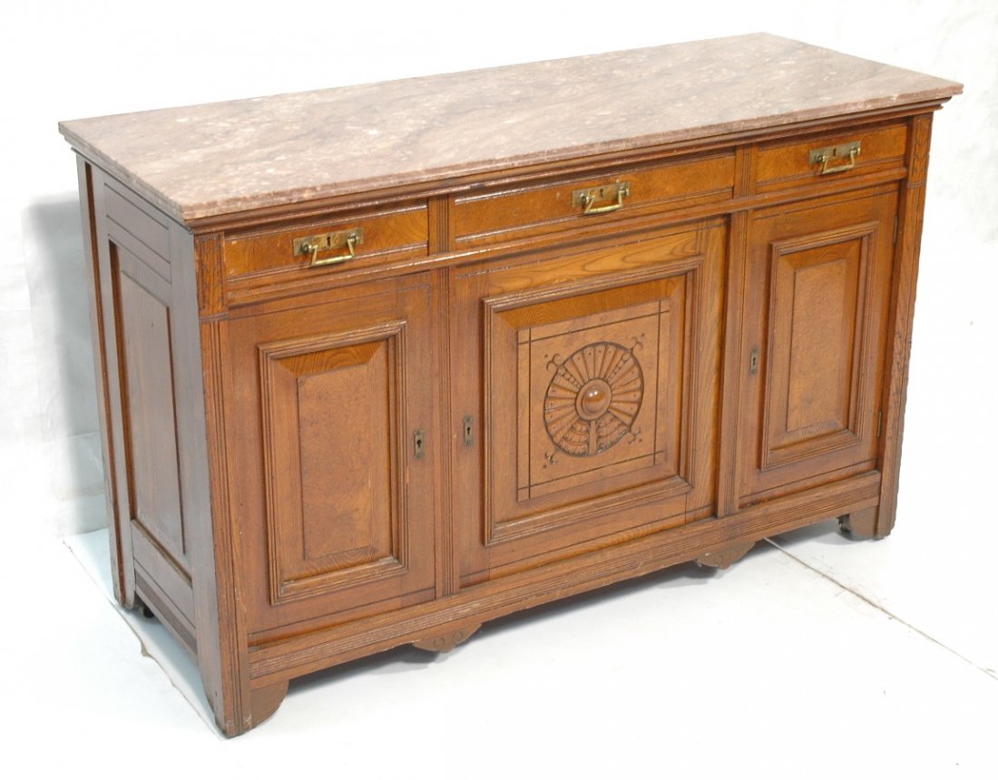 Victorian East Lake Marble Top Sideboard Buffet.: Victorian East Lake Marble Top Sideboard Buffet. Carved panel door.-- Dimensions: H: 36.5 inches: W: 58.75 inches: D: 22.25 inches ---