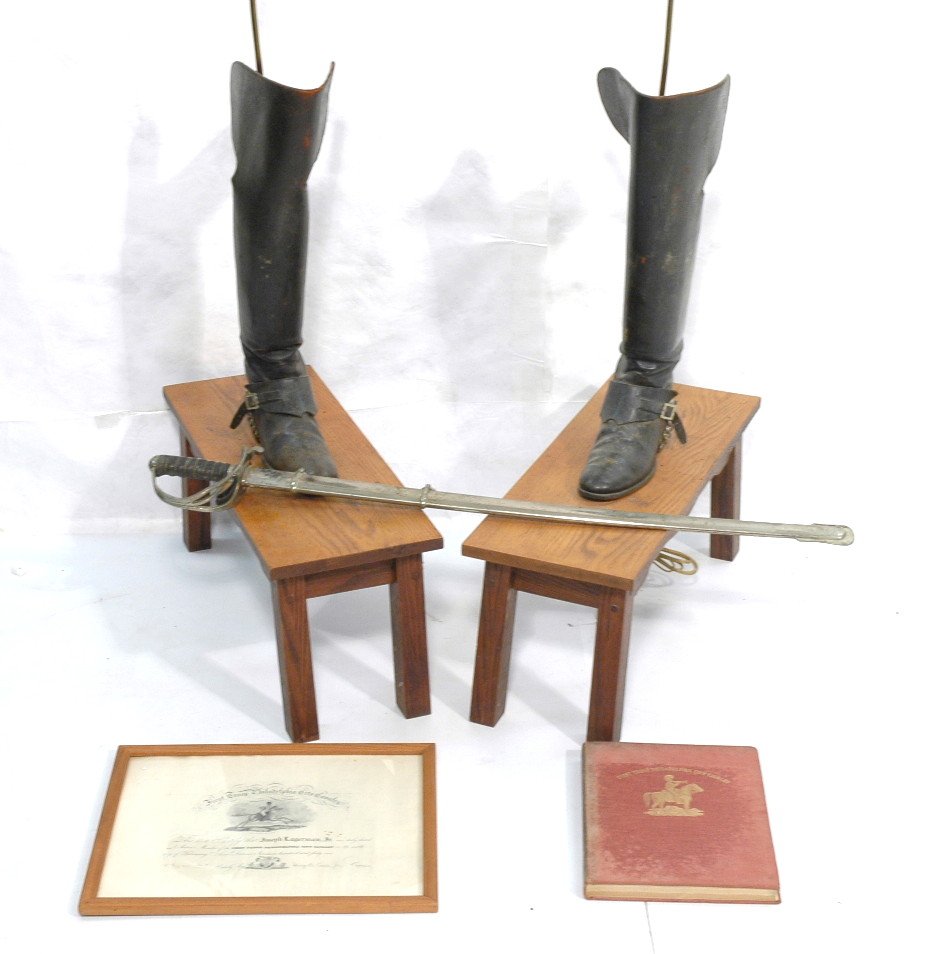 5 pc lot First Troop Philadelphia City Cavalry. H: 5 pc lot First Troop Philadelphia City Cavalry. Hard bound book (July 1, 1948). Membership certificate 1941. FTPCC Sword, marked. Pr lamps made with black leather cavalry boots. Joseph Lagerman, Jr. 5