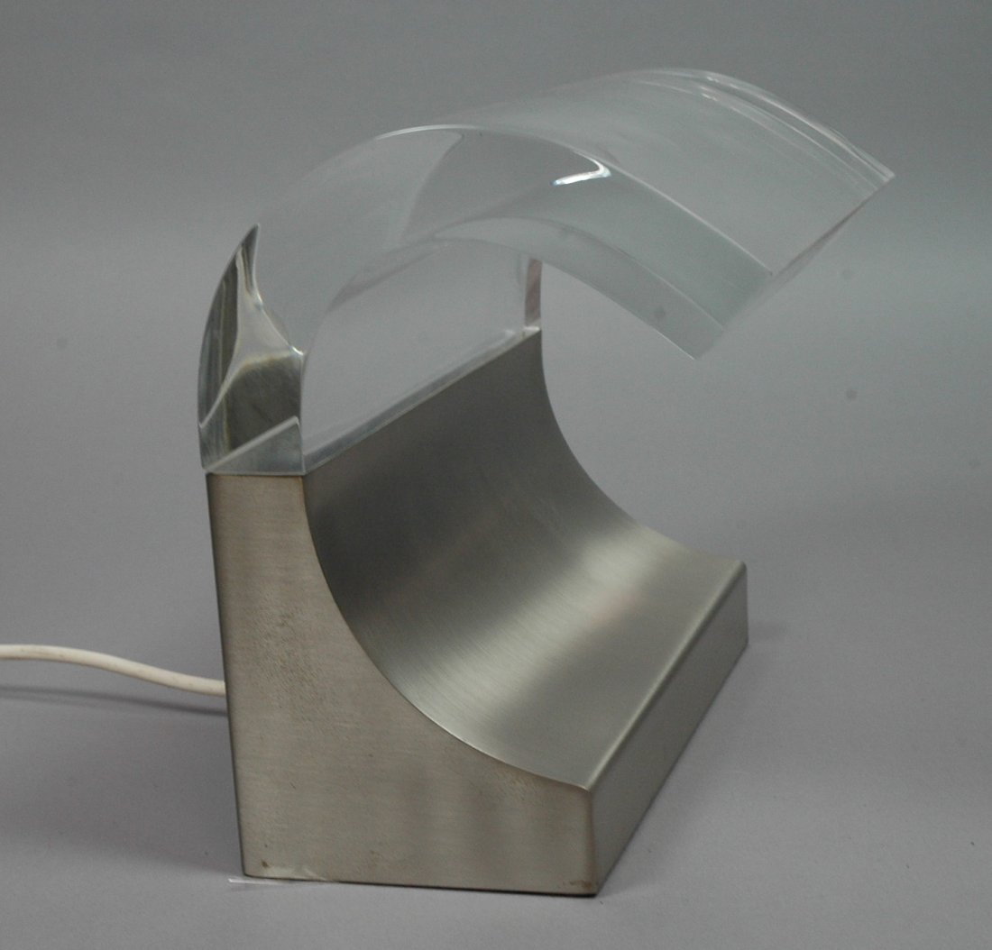 Joe Colombo Style Table Lamp. Inch thick lucite o: Joe Colombo Style Table Lamp. Inch thick lucite on stainless base. Labeled MISSAGLIA ITALY.-- Dimensions: H: 8 inches: W: 9.5 inches: D: 6 inches --- US Shipping charge: $28