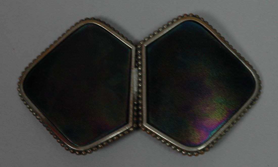 Antique Art Glass 2 part Belt Buckle. Iridescent: Antique Art Glass 2 part Belt Buckle. Iridescent Art Glass set in bead trimmed frame. -- Dimensions: H: 3 inches: W: 5 inches --- US Shipping charge: $7