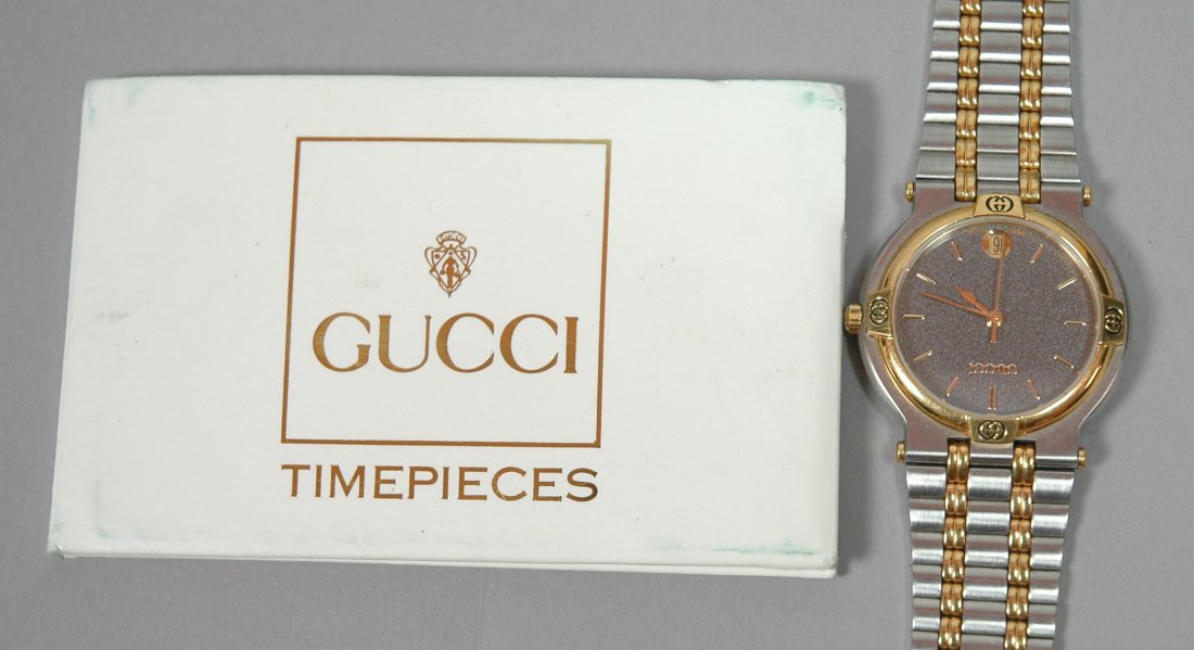 GUCCI Stainless Steel Mans Watch. Model 9000M. Se: GUCCI Stainless Steel Mans Watch. Model 9000M. Serial Number 0194940. In box with Gucci brochure & International Warranty Card. Serial numbers match. -- Dimensions: : L: 7.75 inches --- US Shipping ch