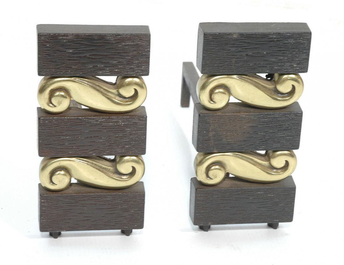 Pair Donald Deskey Andirons. Brass and Iron. Mark: Pair Donald Deskey Andirons. Brass and Iron. Marked Bennett.-- Dimensions: H: 11.5 inches: W: 5.5 inches: D: 18 inches --- US Shipping charge: $50