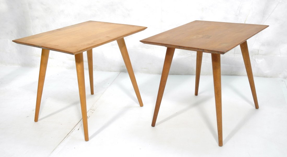 Pair Paul McCobb Planner Group Side Tables. Bevel: Pair Paul McCobb Planner Group Side Tables. Beveled top on peg legs. Foil label.-- Dimensions: H: 19.75 inches: W: 24 inches: D: 18.25 inches ---