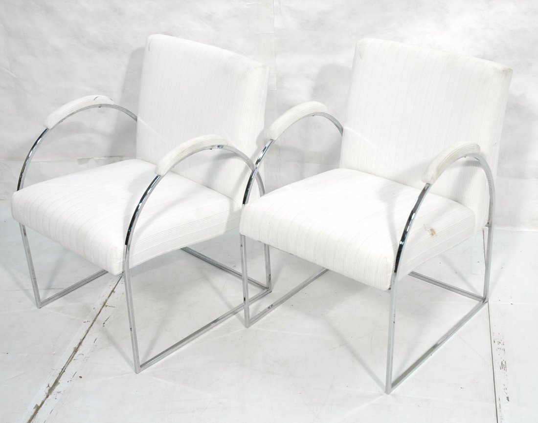 Pr MILO BAUGHMAN Chrome Arched Side Arm Chairs. S: Pr MILO BAUGHMAN Chrome Arched Side Arm Chairs. Square tubular chrome frame Lounge Chairs. -- Dimensions: H: 31 inches: W: 22 inches: D: 26 inches ---
