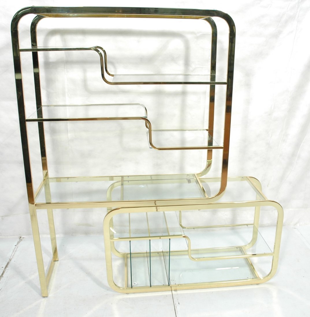 Brass & Glass Decorator Etagere Display Shelf. Gl: Brass & Glass Decorator Etagere Display Shelf. Baughman style. Glass Shelves. Magazine rack on bottom. -- Dimensions: H: 71.5 inches: D: 18 inches: L: 63 inches ---