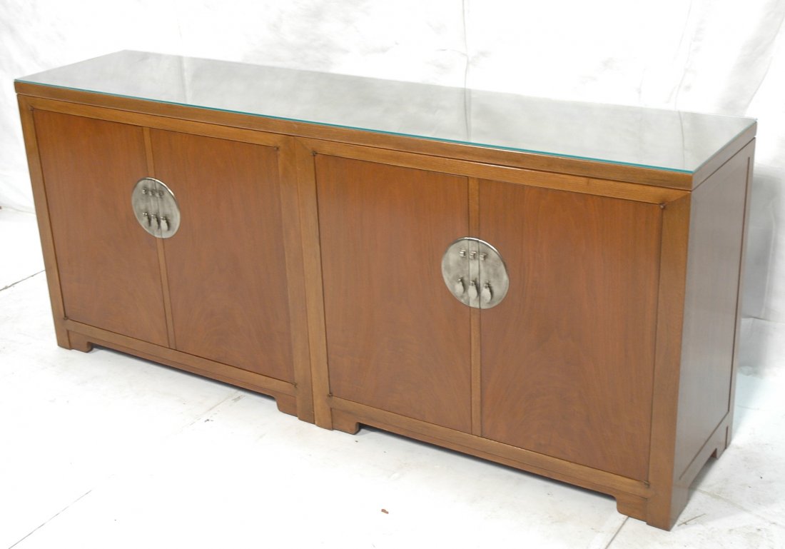 BAKER Credenza Server Cabinet. Comprised of two 2: BAKER Credenza Server Cabinet. Comprised of two 2 door cabinets with Solid wood top. Large decorative silver hardware. Marked with metal tag.-- Dimensions: H: 34 inches: D: 18 inches: L: 79.5 inches -