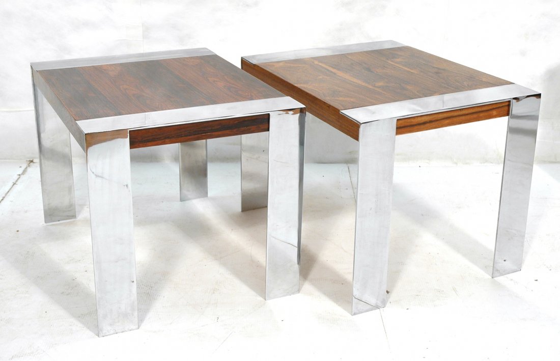 Pr Rosewood & Chrome Banded Side Tables. MILO BAU: Pr Rosewood & Chrome Banded Side Tables. MILO BAUGHMAN style. 4" wide chrome Trim & legs. -- Dimensions: H: 21 inches: W: 28.25 inches: D: 22 inches ---
