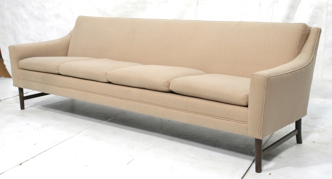 DUNBAR style Sofa Couch. Four Seat Cushions. Tone: DUNBAR style Sofa Couch. Four Seat Cushions. Tone on tone fabric upholstery. Wood stretcher & legs.-- Dimensions: H: 29 inches: D: 31 inches: L: 92 inches ---