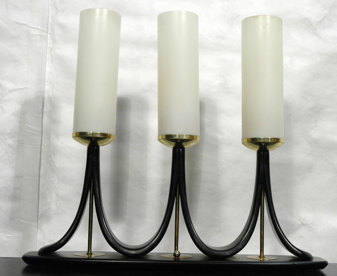 TOMMI PARZINGER style Table Lamp. Ebonized Base w: TOMMI PARZINGER style Table Lamp. Ebonized Base with three petal lights. Acrylic column shades on brass caps-- Dimensions: H: 24 inches: W: 27.5 inches: D: 6 inches ---