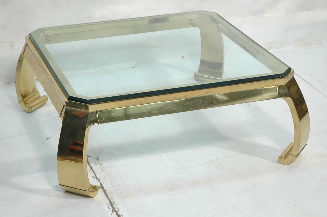 Heavy Italian Mastercraft Style Brass and Glass T: Heavy Italian Mastercraft Style Brass and Glass Table. Asian influenced coffee cocktail table. Thick beveled glass top. -- Dimensions: H: 15 inches: W: 40 inches ---
