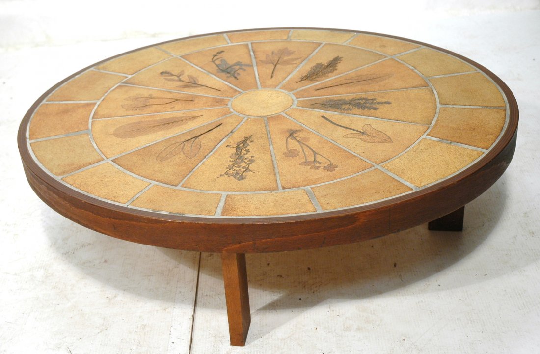 Roger Capron Coffee Cocktail Table. Oval with woo: Roger Capron Coffee Cocktail Table. Oval with wood frame. Leaf imprinted. Marked.-- Dimensions: H: 11.75 inches: W: 41.5 inches: D: 36 inches ---