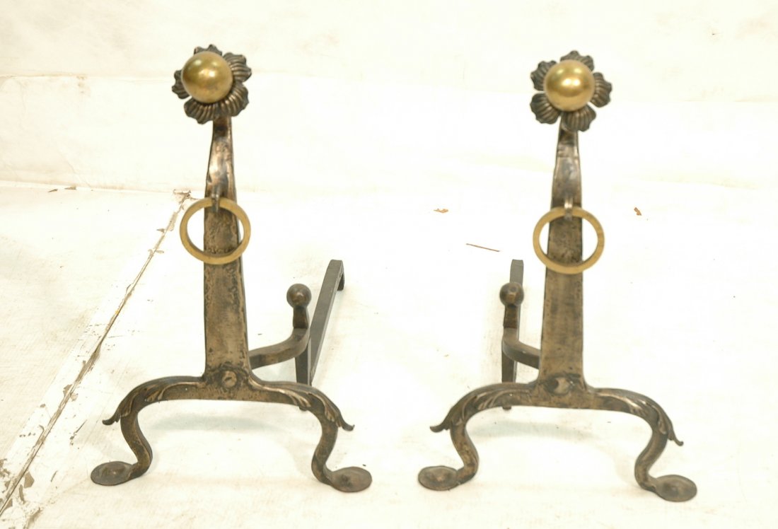 Heavy Iron & Brass Andirons with floral top with: Heavy Iron & Brass Andirons with floral top with brass ball. -- Dimensions: H: 22 inches: W: 13.5 inches: D: 21.5 inches ---