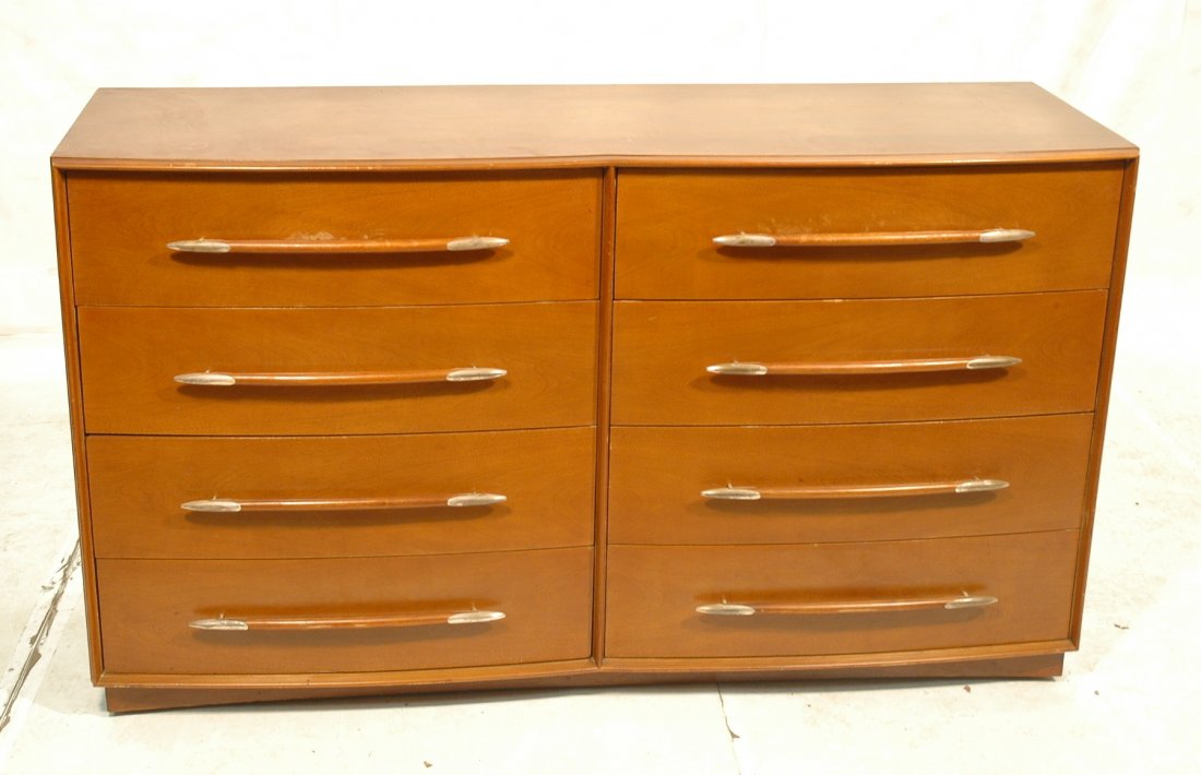 ROBSJOHN GIBBINGS Eight Drawer Dresser Chest. Sig: ROBSJOHN GIBBINGS Eight Drawer Dresser Chest. Signature Robsjohn pulls. Widdicomb label. -- Dimensions: H: 39 inches: D: 22 inches: L: 68 inches ---