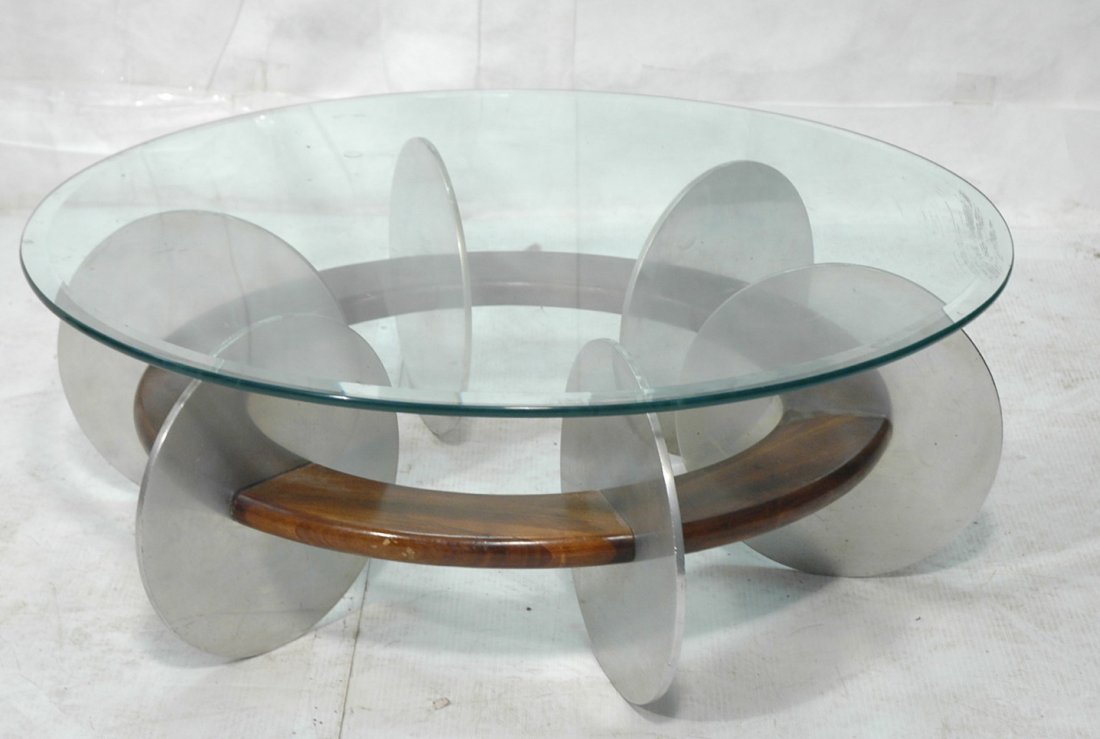 Aluminum and Walnut Coffee table round with Alumi: Aluminum and Walnut Coffee table round with Aluminum disks and wood.-- Dimensions: H: 12.5 inches: W: 37 inches: D: 37 inches ---