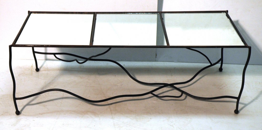 Giacometti Style Mirror top coffee table with Iro: Giacometti Style Mirror top coffee table with Iron Base. Bronze finish on base.-- Dimensions: H: 17 inches: W: 50 inches: D: 29 inches ---