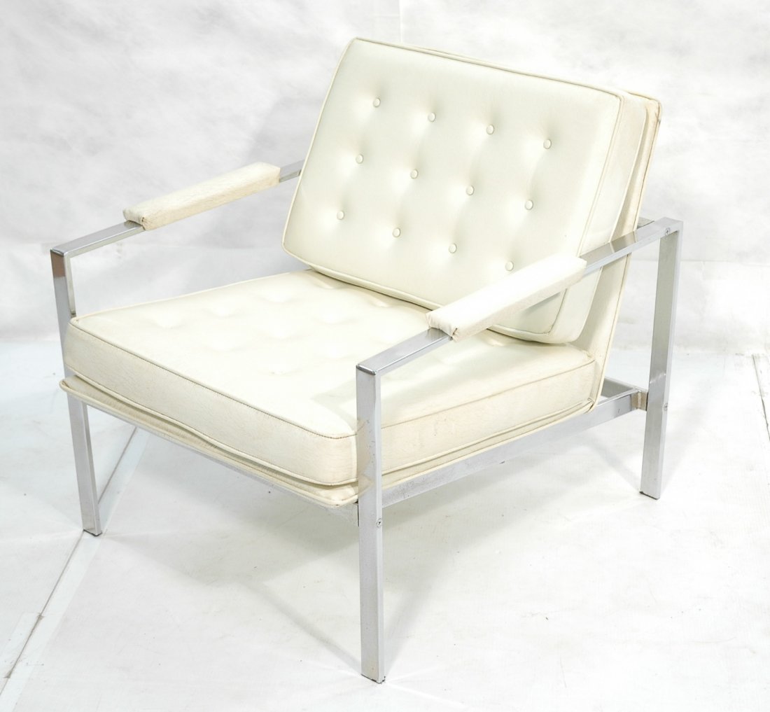 MILO BAUGHMAN style Lounge Chair. Flat chrome fra: MILO BAUGHMAN style Lounge Chair. Flat chrome frame. Cream vinyl upholstery.-- Dimensions: H: 30 inches: W: 29 inches: D: 33 inches ---