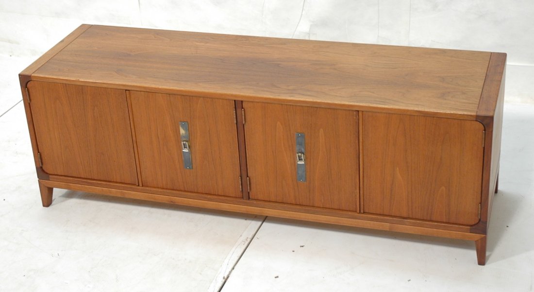 American Modern Walnut Low Credenza. Four doors.: American Modern Walnut Low Credenza. Four doors. Tapered legs.-- Dimensions: H: 18.25 inches: W: 54 inches: D: 16 inches ---