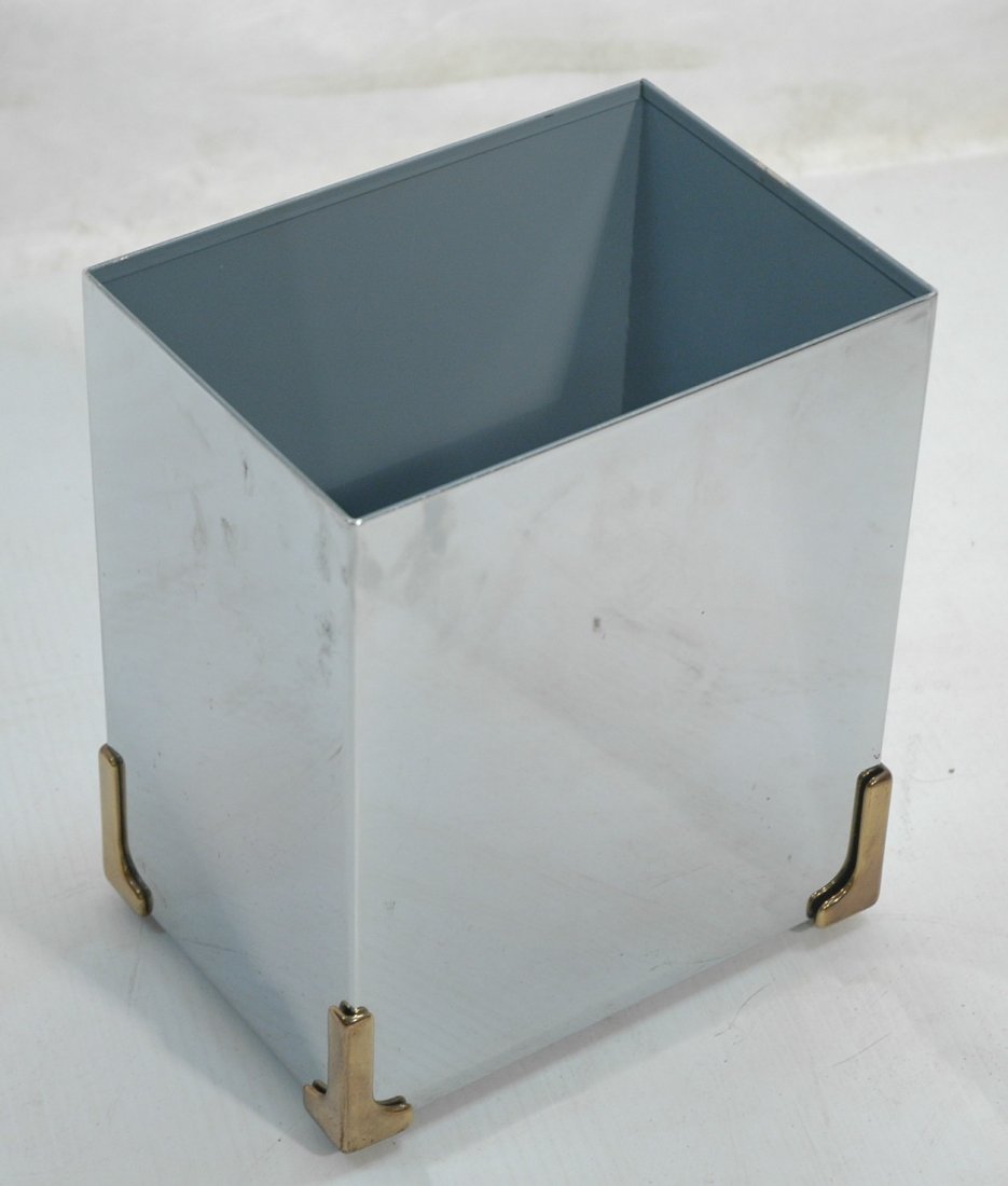 RIALTO Mirror Chrome Wastebasket. Decorative bras: RIALTO Mirror Chrome Wastebasket. Decorative brass corners. Original hangtag.-- Dimensions: H: 10.25 inches: W: 8.75 inches: D: 6.25 inches ---