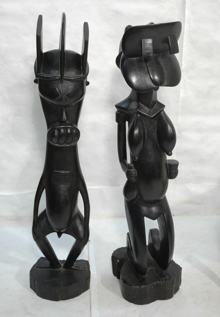 2 large MATINGI Carved Wood Sculptures. African Ebony.: 2 MATINGI Carved Wood Sculptures. African Ebony. Modern Art?-- Dimensions: H: 51 inches: W: 11 inches ---