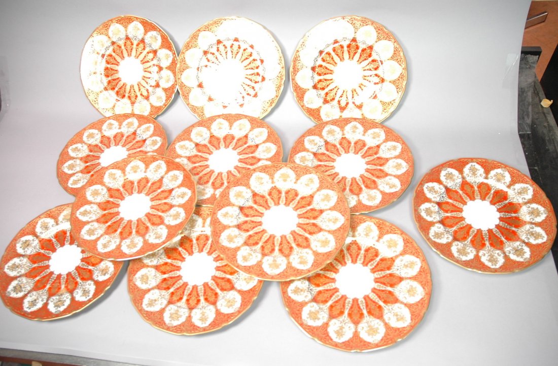 Set 12 ROYAL DOULTON England Fancy service Plates: Set 12 ROYAL DOULTON England Fancy service Plates. Orange Rust Pattern with raised gold paint highlights. -- Dimensions: H: 10.5 inches ---