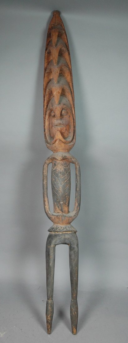Carved African Wood Totem.: Carved African Wood Totem. -- Dimensions: H: 49 inches: W: 6 inches: D: 4 inches ---