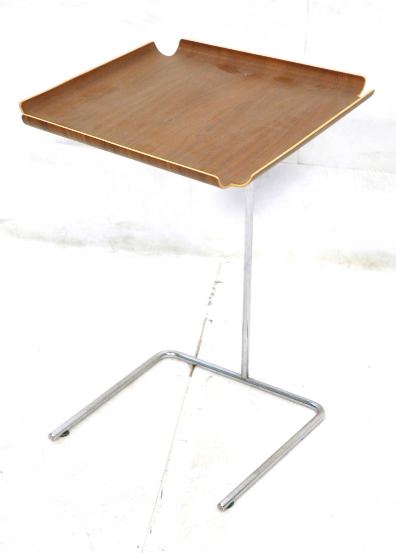 GEORGE NELSON for HERMAN MILLER Tray Table. Lamin: GEORGE NELSON for HERMAN MILLER Tray Table. Laminated wood tray top on chromed steel base. Marked. -- Dimensions: H: 21.25 inches: W: 15 inches: D: 15 inches ---