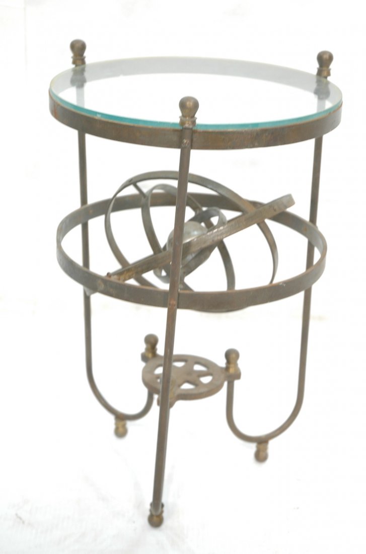 Vintage Metal Gyroscope Side Table. Glass Top. Th: Vintage Metal Gyroscope Side Table. Glass Top. Three arched legs with movable gyroscope center: 4 rings and one ball. -- Dimensions: H: 20 inches: W: 13.25 inches: D: 13.25 inches ---