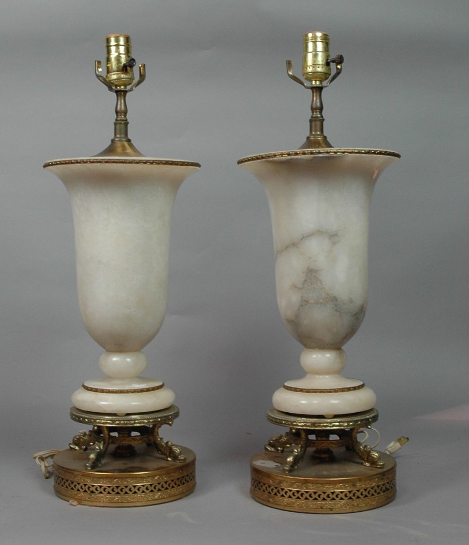 Pair Alabaster Urn Lamps. Metal trim and dolphin: Pair Alabaster Urn Lamps. Metal trim and dolphin base.-- Dimensions: H: 23 inches: W: 8 inches ---