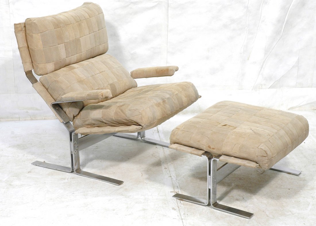 Milo Baughman style Chrome Lounge Chair & Ottoman: Milo Baughman style Chrome Lounge Chair & Ottoman. Heavy flat chrome frame. Patchwork suede upholstery. Spring form chair.-- Dimensions: H: 35.5 inches: W: 32 inches: D: 36 inches ---