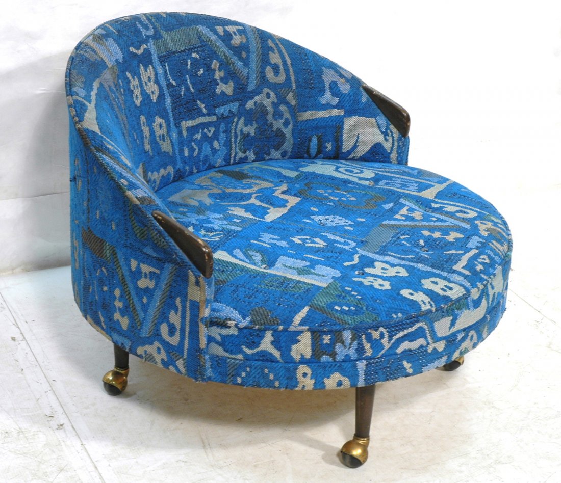 ADRIAN PEARSALL Moon Chair. Round form. Patterned: ADRIAN PEARSALL Moon Chair. Round form. Patterned Blue Fabric Upholstery. On casters. -- Dimensions: H: 29.25 inches: W: 38 inches ---