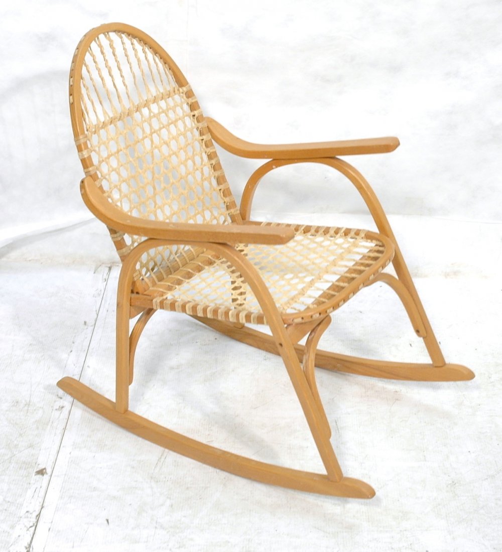Snow Shoe Form Woven Rocker Rocking Chair. Woven: Snow Shoe Form Woven Rocker Rocking Chair. Woven gut seat & back. VERMONT TUBBS. American made. -- Dimensions: H: 34.75 inches: W: 21.5 inches: D: 33 inches ---