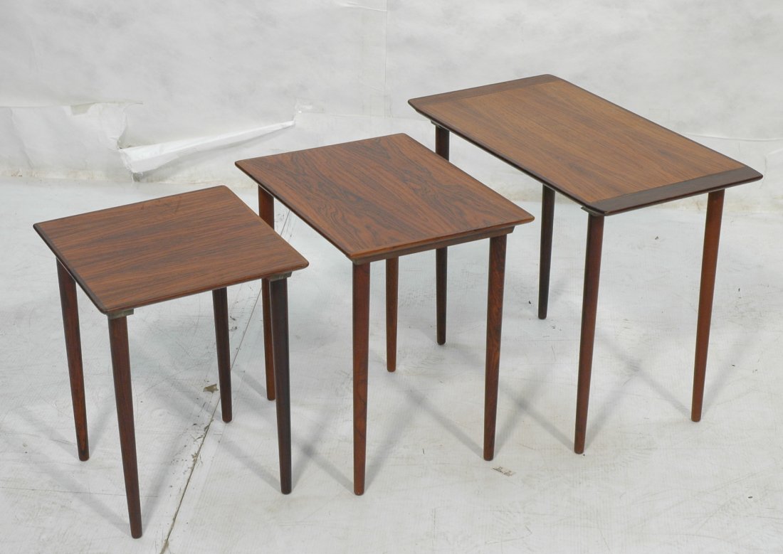 3pc Rosewood Danish Modern Nesting Tables. Banded: 3pc Rosewood Danish Modern Nesting Tables. Banded sides. Tapered peg legs.-- Dimensions: H: 20.25 inches: W: 25 inches: D: 14 inches ---