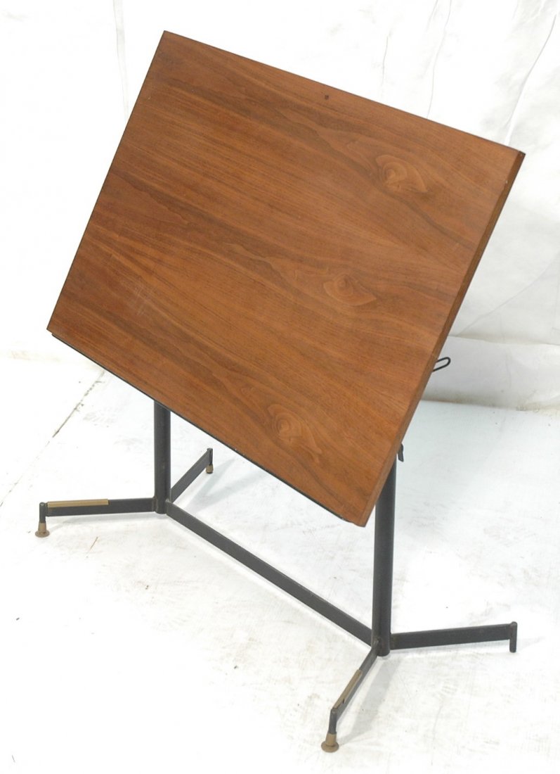 Walnut Drafting Table with Stylish Iron Base. Adj: Walnut Drafting Table with Stylish Iron Base. Adjustable height. American Modern.-- Dimensions: H: 37.5 inches: W: 36 inches: D: 24 inches ---