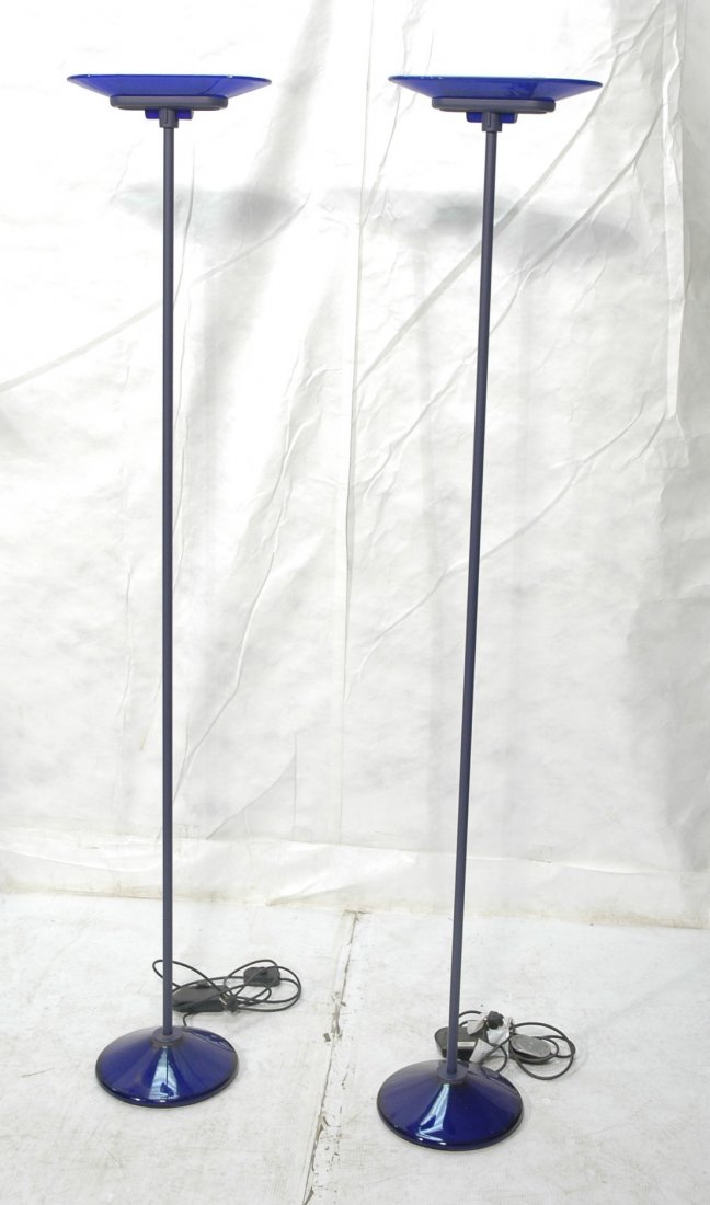 Pair Arteluce Italian Floor Lamps. Milano Italy.: Pair Arteluce Italian Floor Lamps. Milano Italy. Blue glass Top and base. Marked.-- Dimensions: H: 76.75 inches: W: 14.25 inches: D: 12 inches ---