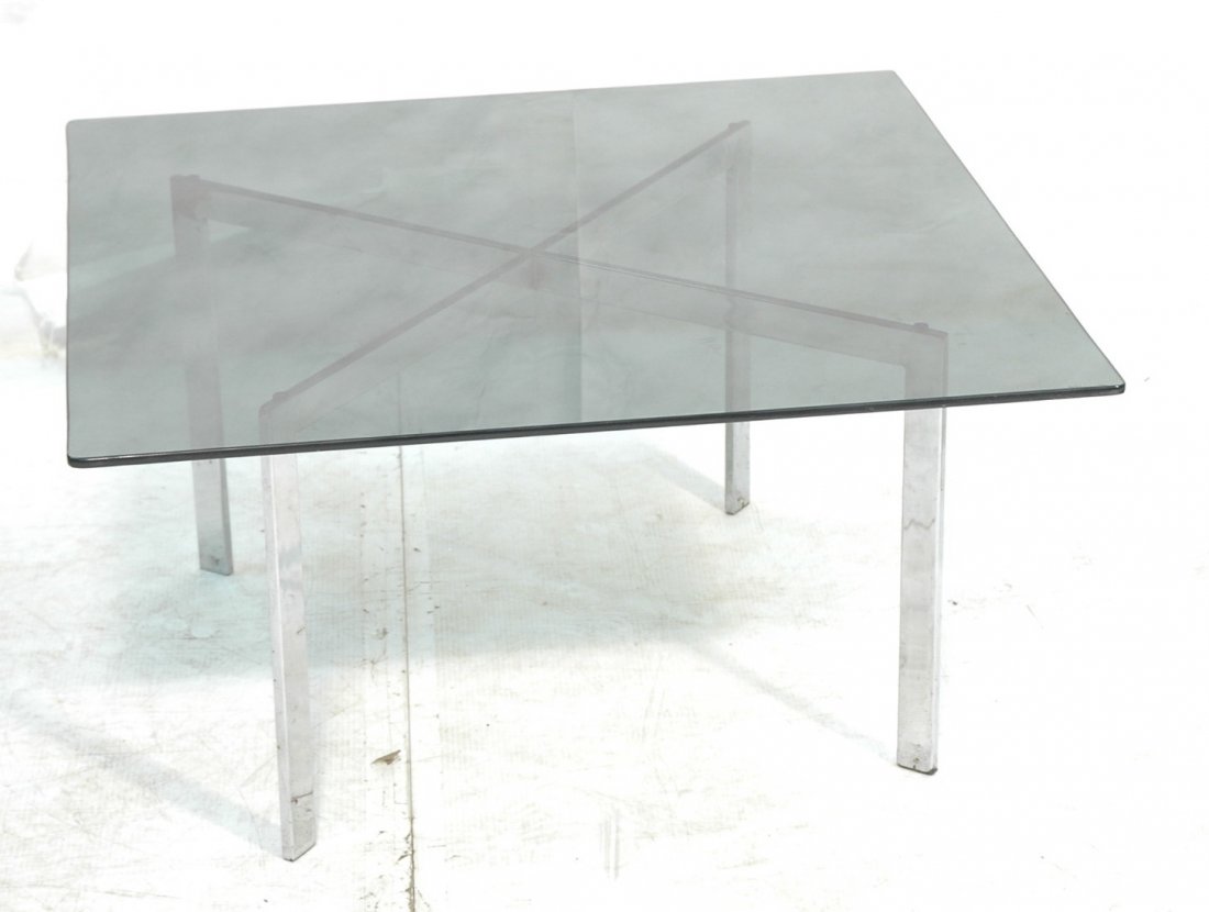 Barcelona style Chrome Glass Top Cocktail Coffee Table: Barcelona style Glass Top Cocktail Coffee Table. Square Smoked Glass. Flat wide chrome "X" base. -- Dimensions: H: 17.75 inches: W: 35 inches: D: 35 inches ---