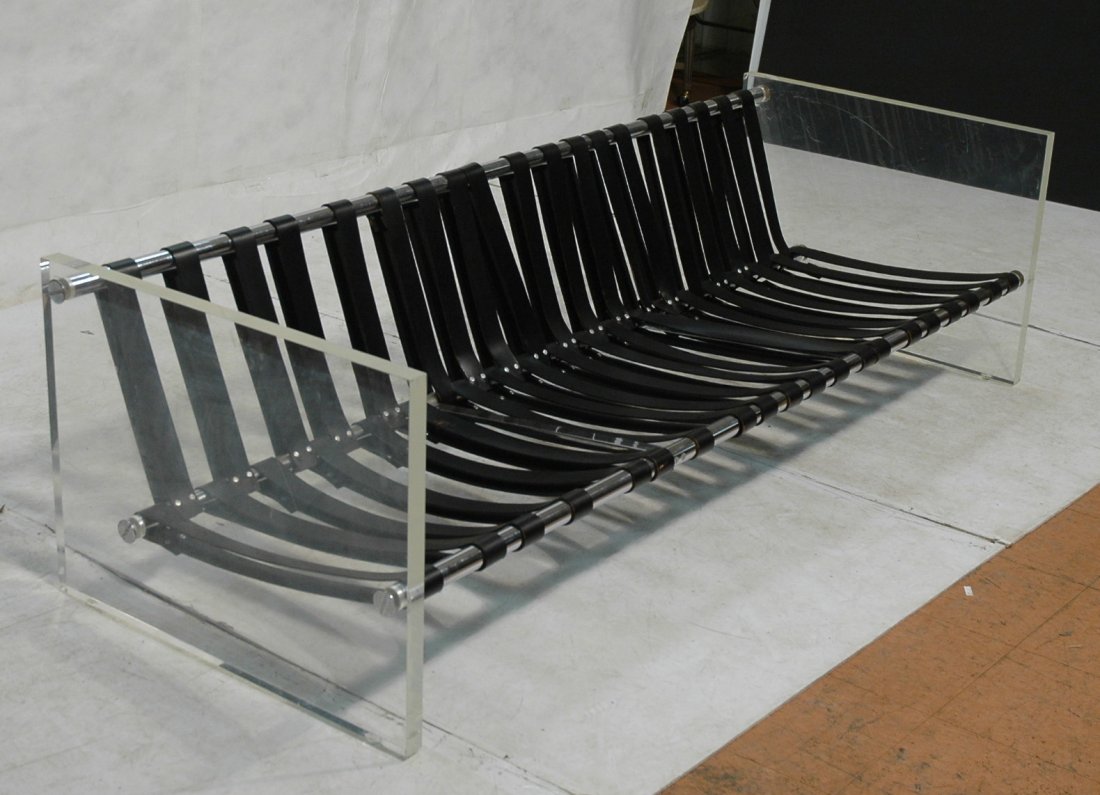 MILO BAUGHMAN Lucite & Chrome Sofa Couch. Wide r: MILO BAUGHMAN Lucite & Chrome Sofa Couch. Wide round chrome tube construction. Thick Lucite sides. Leather straps.-- Dimensions: H: 24.25 inches: D: 32 inches: L: 85 inches ---