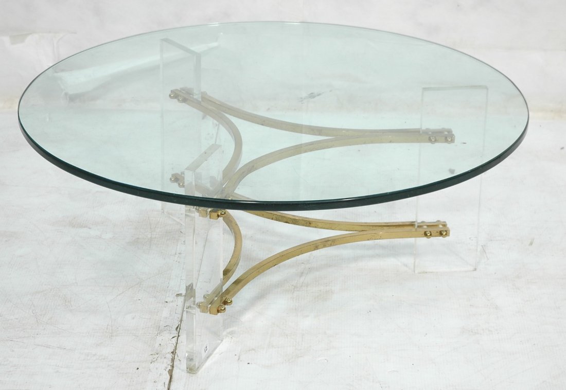 Charles Hollis Jones Coffee Cocktail Table. Bras: Charles Hollis Jones Coffee Cocktail Table. Brass Lucite and glass. .75" thick glass.-- Dimensions: H: 16.75 inches: W: 40 inches ---