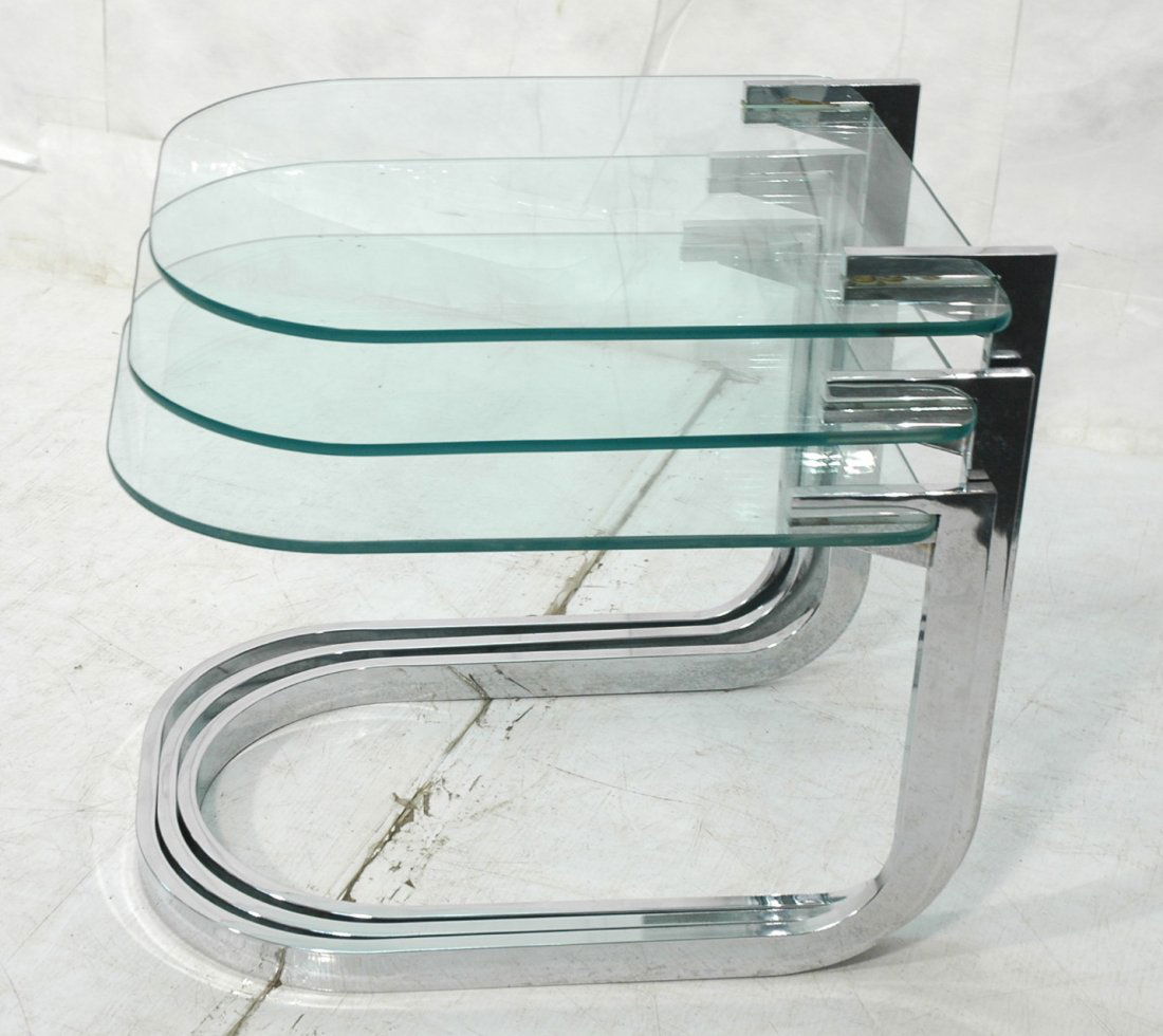 Nesting Set of DIA Tables Chrome and glass. Unmar: Nesting Set of DIA Tables Chrome and glass. Unmarked.-- Dimensions: H: 22 inches: W: 23 inches: D: 20 inches ---
