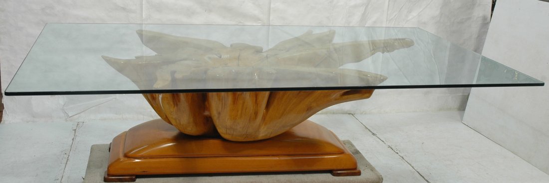 Extremely Large Decorator Dining Table. Large fre: Extremely Large Decorator Dining Table. Large freeform wood base with large thick glass Top. Arched base.-- Dimensions: H: 29 inches: W: 60 inches: D: 108 inches ---