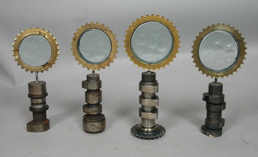 4 pcs Industrial Sculptures Engraved F Bejar. Ste: 4 pcs Industrial Sculptures Engraved F Bejar. Steel, Brass & Glass. Cog wheel design. Tallest is 9" high.-- Dimensions: H: 8.25 inches: W: 4 inches --- US Shipping charge: $35
