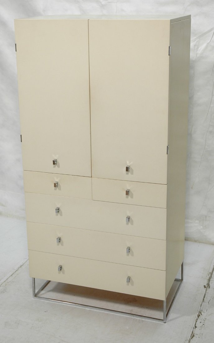 MILO BAUGHMAN style Gentleman's Wardrobe Chest. S: MILO BAUGHMAN style Gentleman's Wardrobe Chest. Square chrome base and pulls/hardware. Marked: ROUGIER.-- Dimensions: H: 64 inches: W: 32 inches: D: 20 inches ---