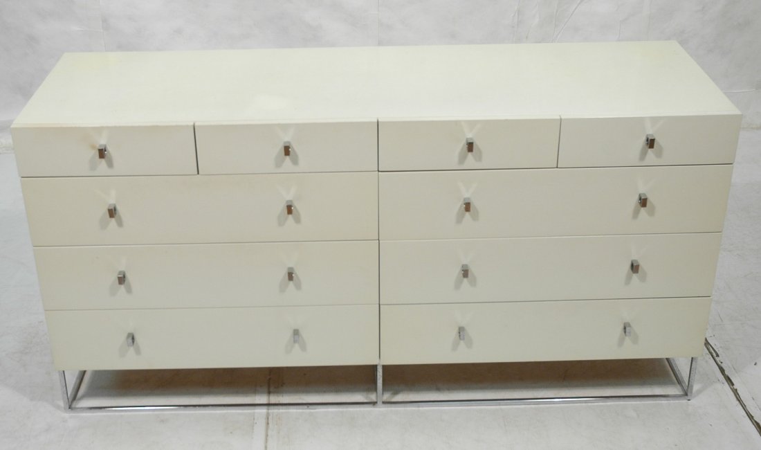 MILO BAUGHMAN style Credenza Dresser Chest. Squar: MILO BAUGHMAN style Credenza Dresser Chest. Square chrome base and pulls/hardware. Ten drawers. Marked: ROUGIER.-- Dimensions: H: 32 inches: D: 21 inches: L: 63.75 inches ---
