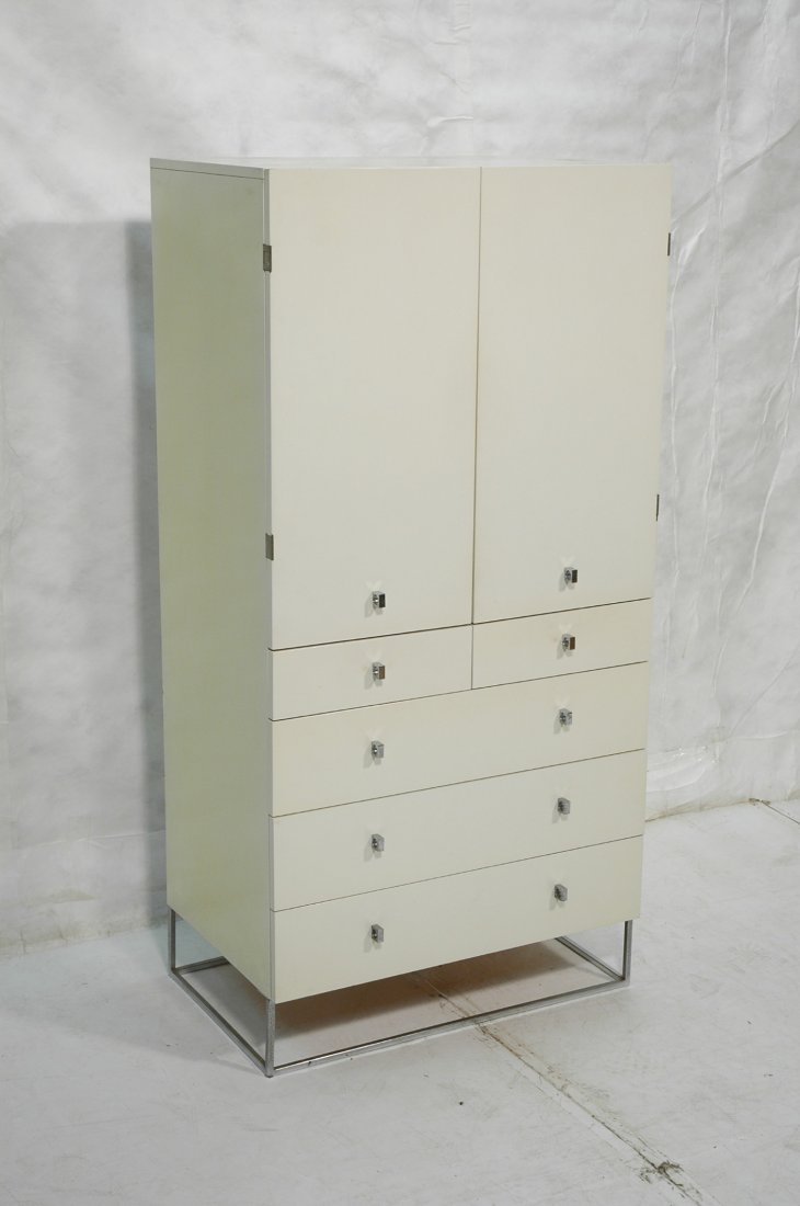 MILO BAUGHMAN style Gentleman's Wardrobe Chest. S: MILO BAUGHMAN style Gentleman's Wardrobe Chest. Square chrome base and pulls/hardware. Marked: ROUGIER.-- Dimensions: H: 64 inches: W: 32 inches: D: 20 inches ---