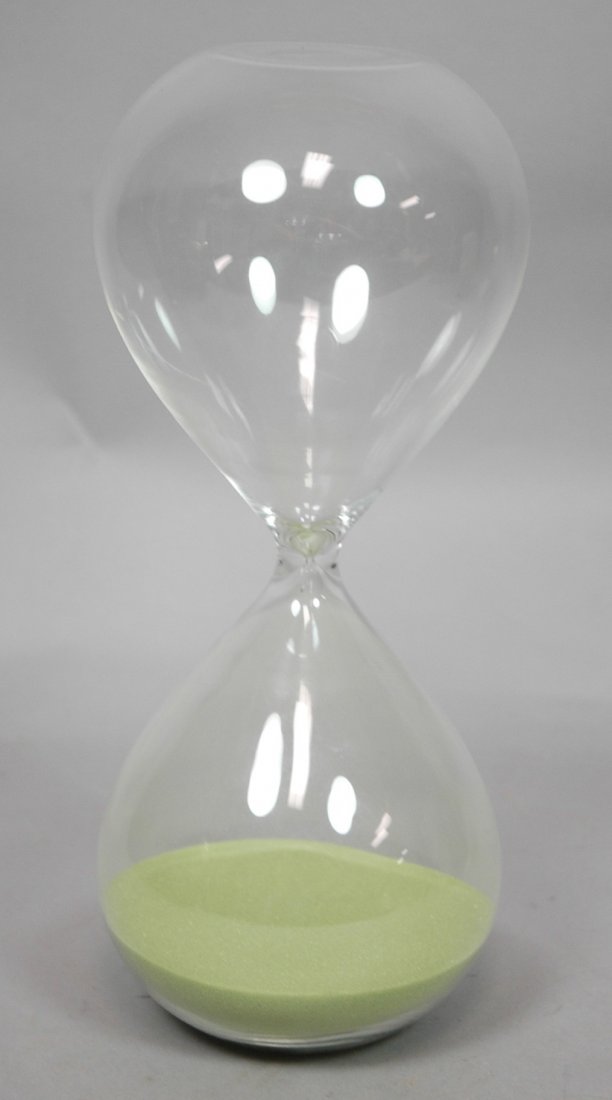 Large Glass Hour Glass. Colored Green Sand. Hourg: Large Glass Hour Glass. Colored Green Sand. Hourglass. -- Dimensions: H: 11 inches: W: 5 inches ---