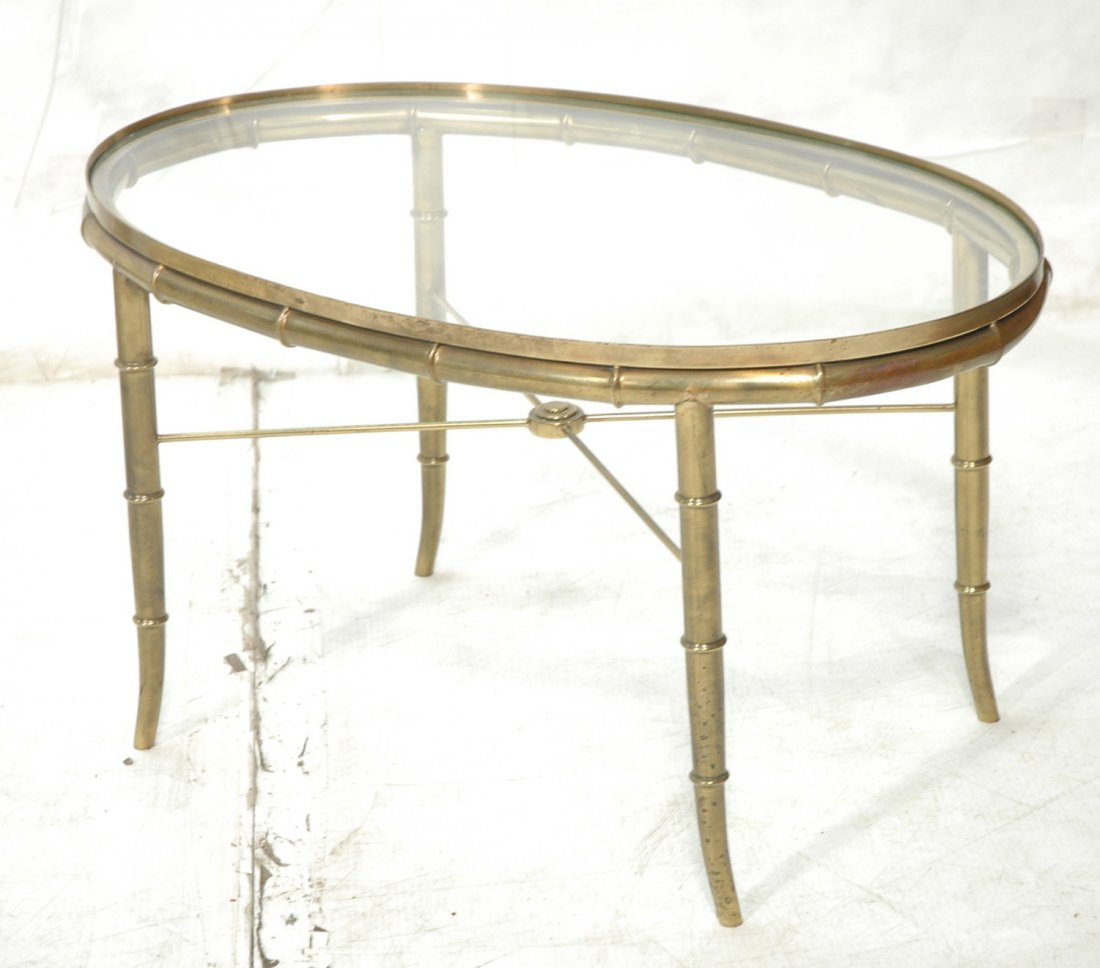 Oval Glass Top Faux Bamboo Decorator Table. Maste: Oval Glass Top Faux Bamboo Decorator Table. Mastercraft style.-- Dimensions: H: 16 inches: W: 29.5 inches: D: 18 inches ---