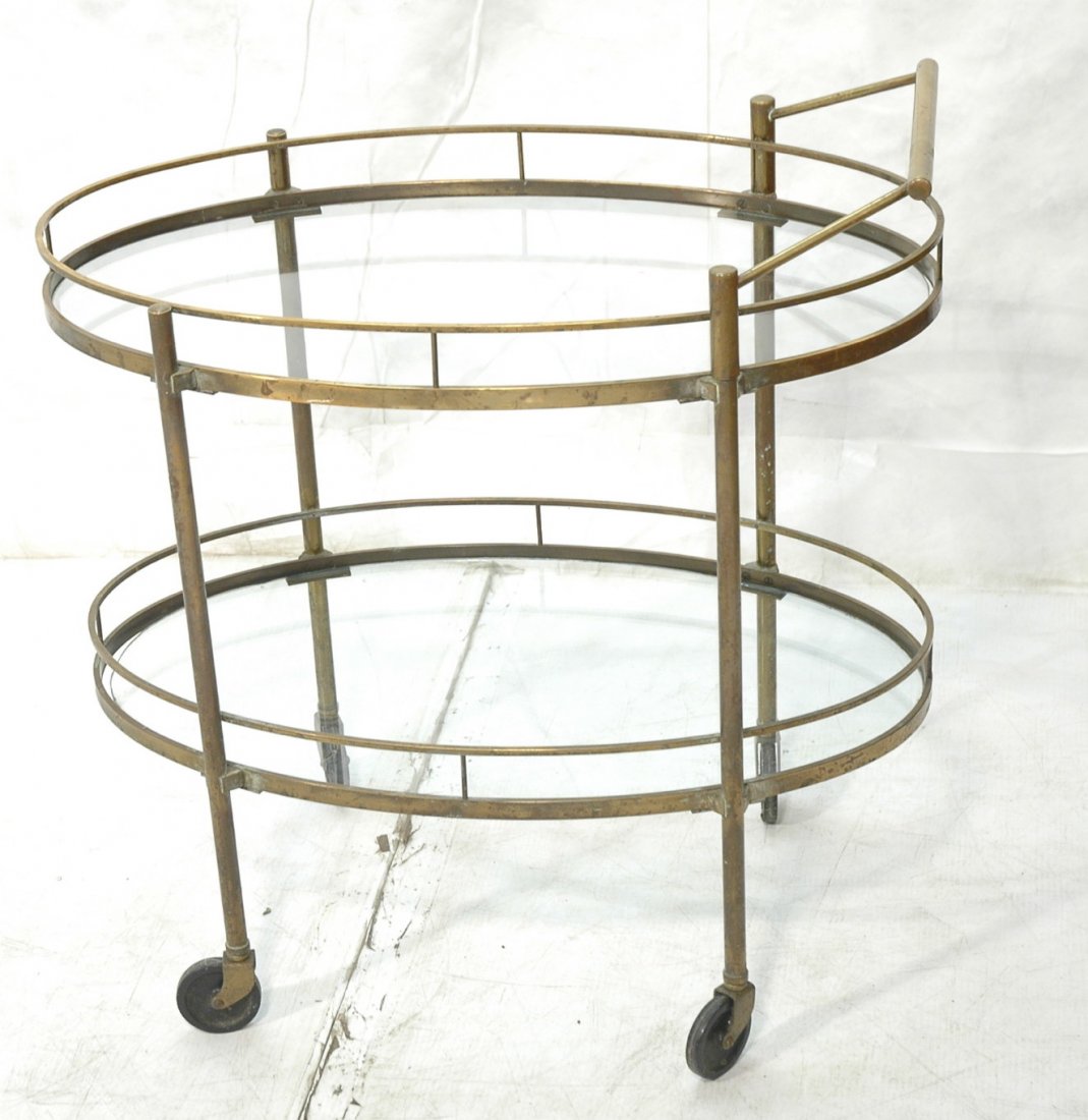 Decorator Solid Brass Bar Cart. Two oval glass se: Decorator Solid Brass Bar Cart. Two oval glass sections with gallery trim. -- Dimensions: H: 32 inches: W: 30.25 inches: D: 18.5 inches ---