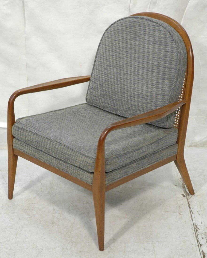 PAUL McCOBB Lounge Chair. Arched Caned Back. Angl: PAUL McCOBB Lounge Chair. Arched Caned Back. Angled Back Tapered Legs. Blue fabric upholstery. Unmarked. -- Dimensions: H: 35 inches: W: 26.5 inches: D: 28 inches ---