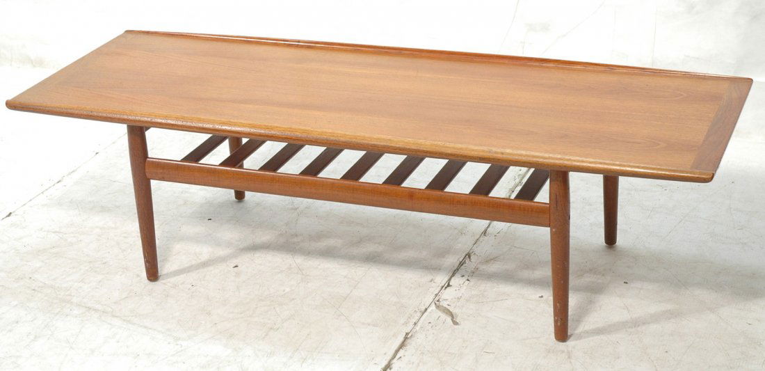 Danish Teak GRETE JALK Coffee Cocktail Table. Lon: Danish Teak GRETE JALK Coffee Cocktail Table. Long table with rolled raised edge trim. -- Dimensions: H: 17.5 inches: D: 23.5 inches: L: 63.25 inches ---