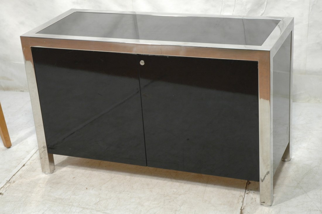 PACE Black Lacquer Two Door Cabinet. Chrome Frame: PACE Black Lacquer Two Door Cabinet. Chrome Frame, legs and trim. Cabinet fitted with interior file drawers. PACE Collection label.-- Dimensions: H: 30 inches: W: 48 inches: D: 20 inches ---