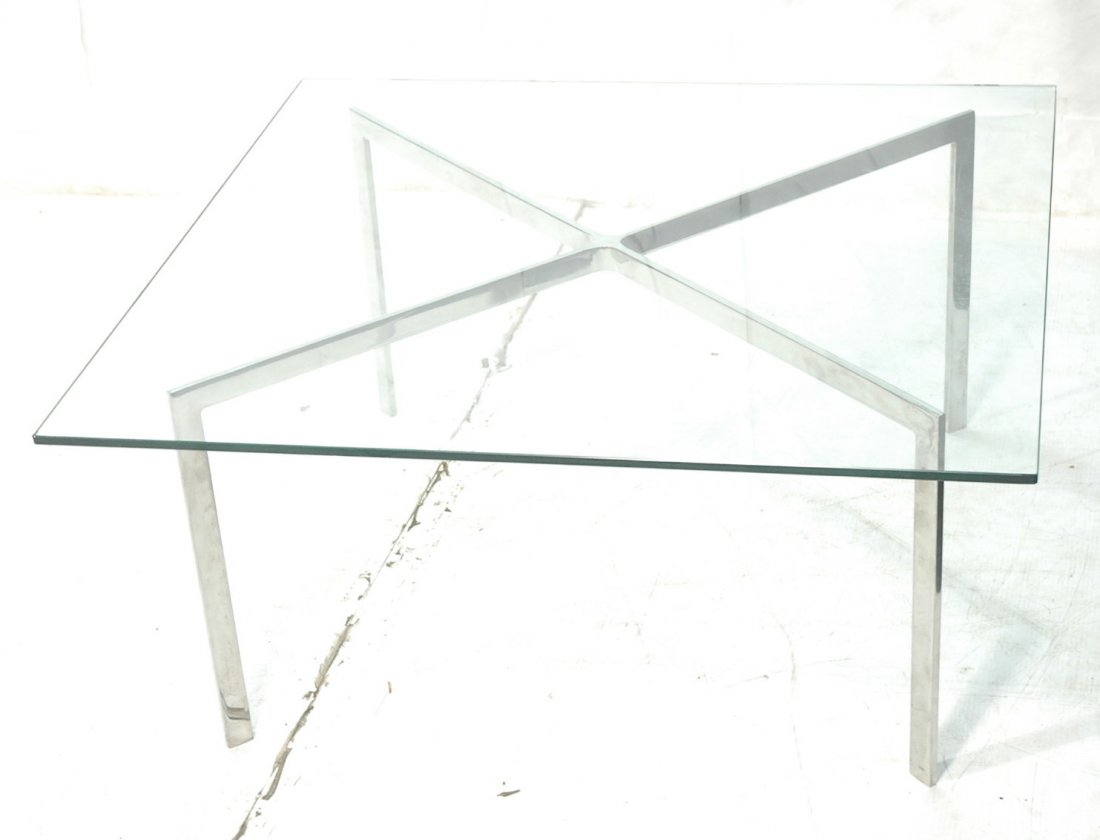 BARCELONA style Cocktail Coffee Table. Chromed St: BARCELONA style Cocktail Coffee Table. Chromed Steel "X" base. 1/2" thick square glass top.-- Dimensions: H: 18 inches: W: 39.5 inches: D: 39.5 inches ---
